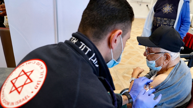 A resident of a private nursing home in Netanya, receives a fourth Pfizer-BioNTech vaccine
