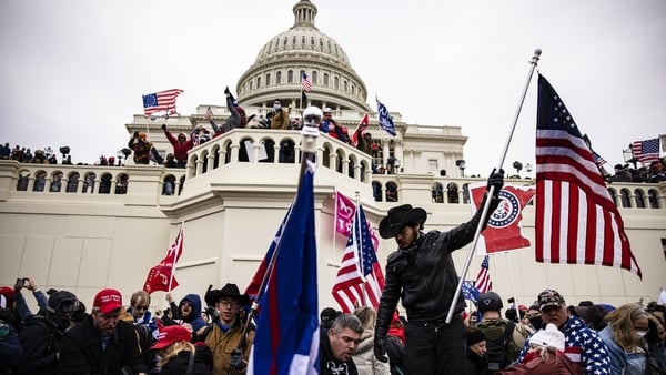 Supporters of Donald Trump storming the US Capitol in January 2021