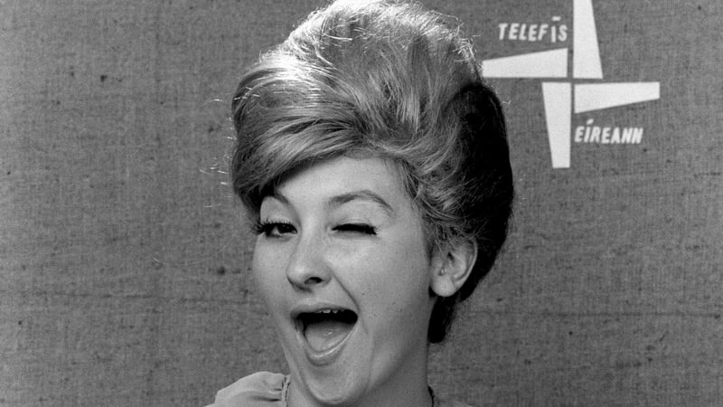 1990: A wink from 'Nighthawks' continuity announcer Bláithín Keaveney (Michelle Houlden)