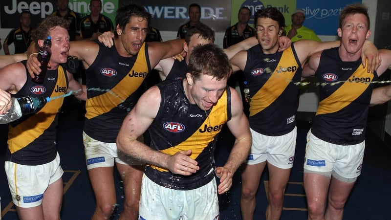 Jamie O'Reilly celebrates with his Richmond team-mates before opting to return to Ireland