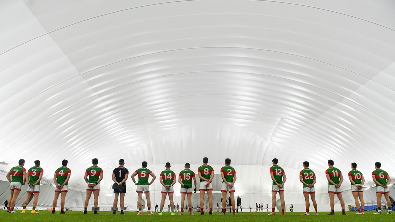 Mayo players line up ahead of throw-in against Galway.