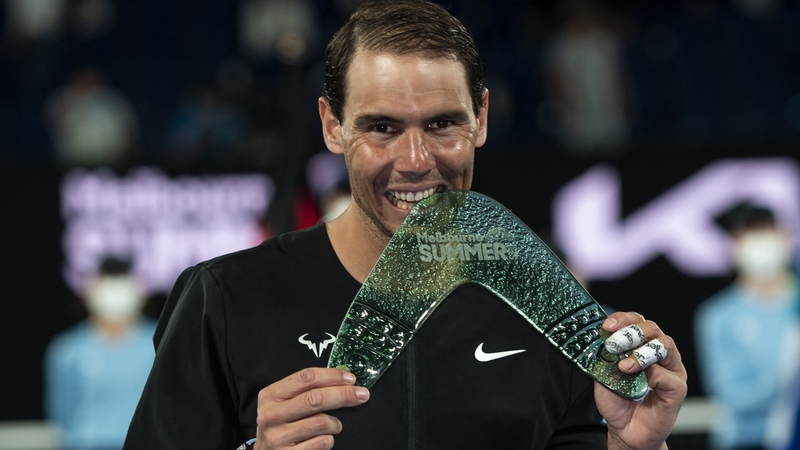 Nadal celebrates with the trophy