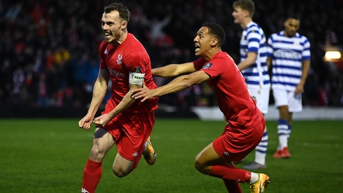 Sam Austin of Kidderminster Harriers celebrates after scoring against Reading