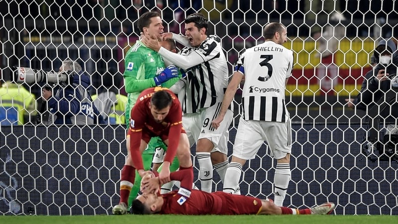 Alvaro Morata and Giorgio Chiellini celebrate with Wojciech Szczesny after he saved penalty