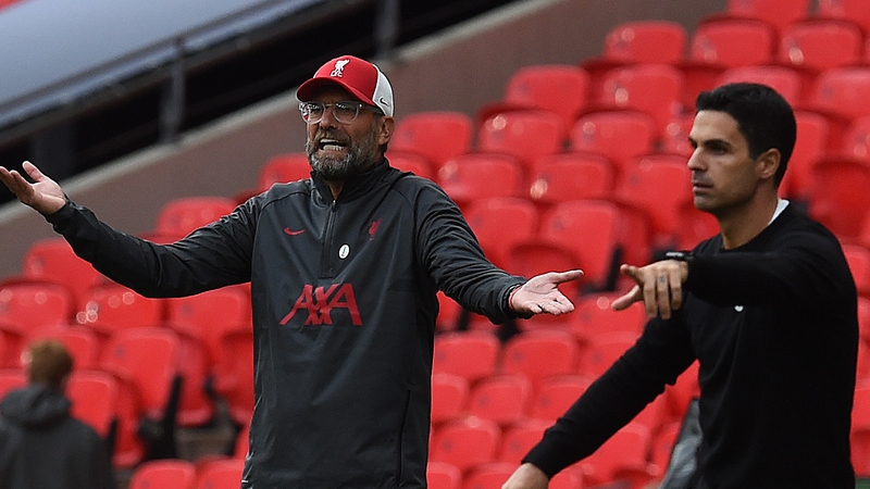 Jurgen Klopp (L) and Mikel Arteta.