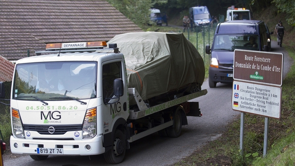French police pictured in 2012 removing the car they believed was used during the shooting of a British family