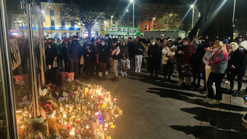 People attending the Galway vigil brought candles and flowers