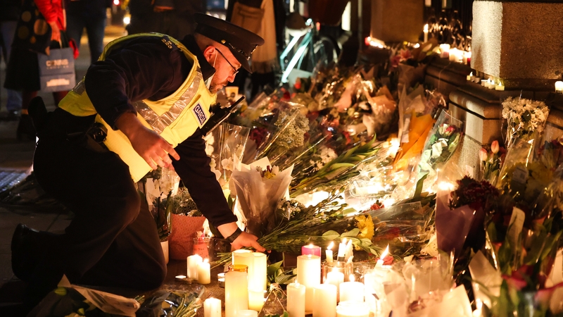 A shrine of candles and flowers for Ashling Murphy outside the Dáil tonight (pic: Rollingnews.ie)