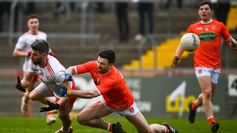 Matthew Donnelly and Aidan Forker battle for possession