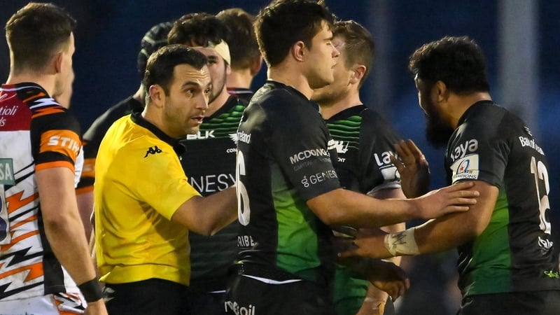 Bundee Aki (r) had words with Mathieu Raynal after the final whistle