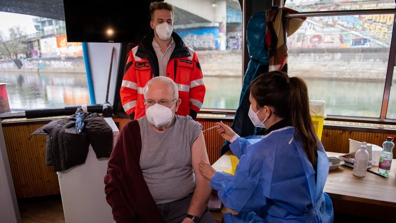 A man gets a Covid-19 vaccination on a passenger ship on Vienna's Danube Canal (File photo)