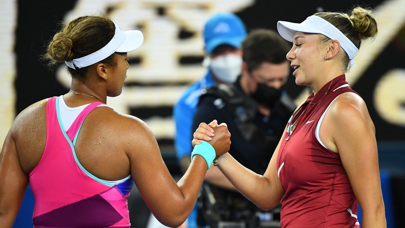 Naomi Osaka shakes hands with Amanda Anisimova after their match on Margaret Court Arena
