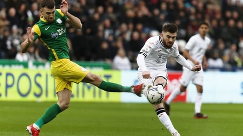 Ryan Manning (R) was the match-winner for Swansea City.