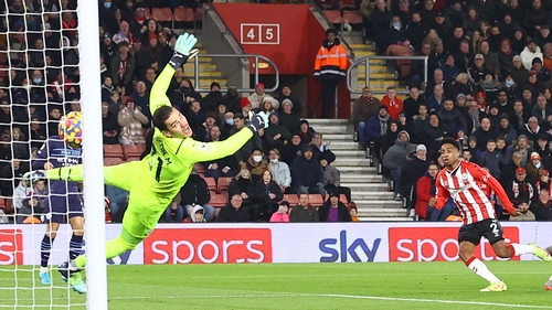 Kyle Walker-Peters steers home the opener for Southampton.