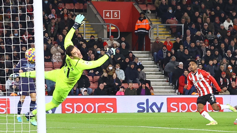 Kyle Walker-Peters steers home the opener for Southampton.
