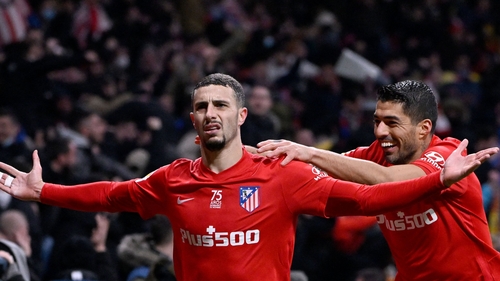 Atletico Madrid's Mario Hermoso (L) won it at the death.