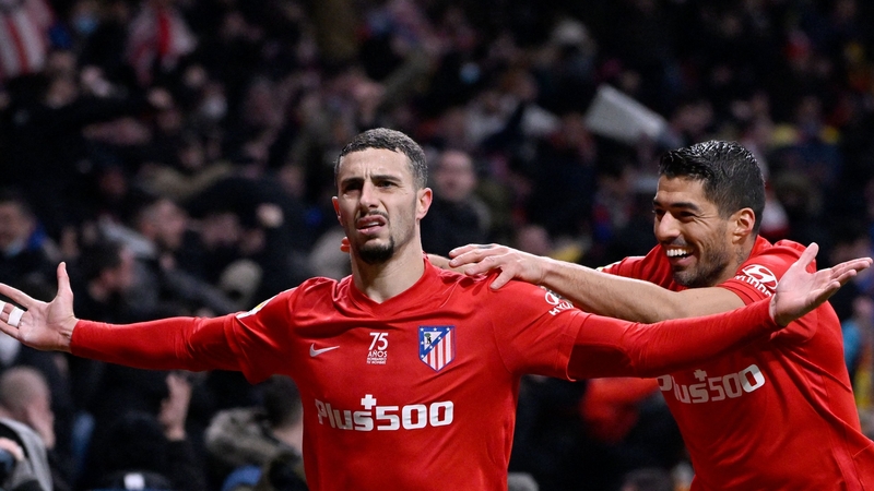 Atletico Madrid's Mario Hermoso (L) won it at the death.