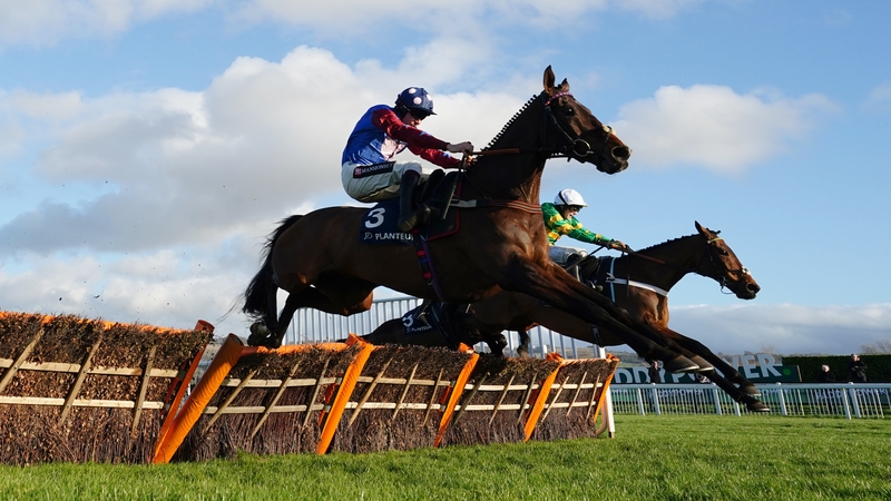 Paisley Park and Champ jump the final flight in unison