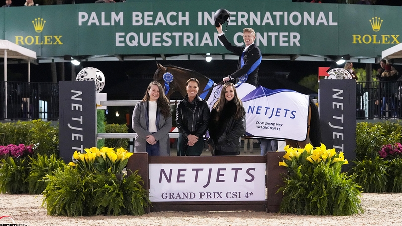 Andrew Bourns celebrates his win at the Winter Equestrian Festival