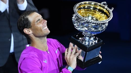 An emotional Rafael Nadal gets his hands on the the Norman Brookes Challenge Cup for the second time in his career