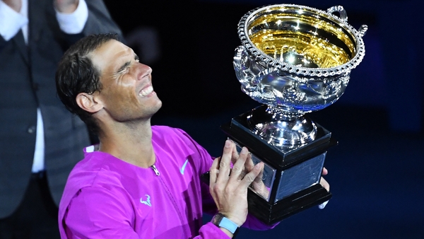 An emotional Rafael Nadal gets his hands on the the Norman Brookes Challenge Cup for the second time in his career