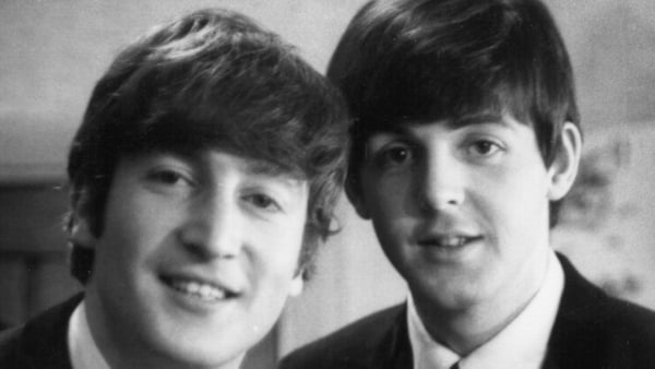 John Lennon and Paul McCartney, seen here backstage in London in December 1963 Photo: Getty Images