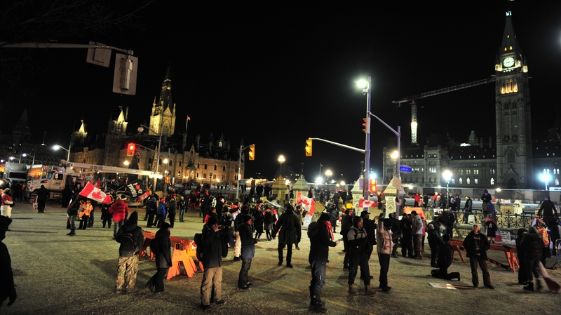 Canadian truckers protest with a convoy of big rigs against vaccine mandates and Covid-19 measures in Ottowa