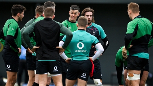 Johnny Sexton talks to team members at training last week