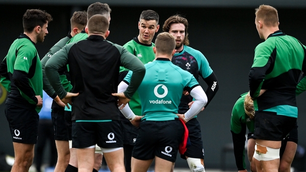 Johnny Sexton talks to team members at training last week