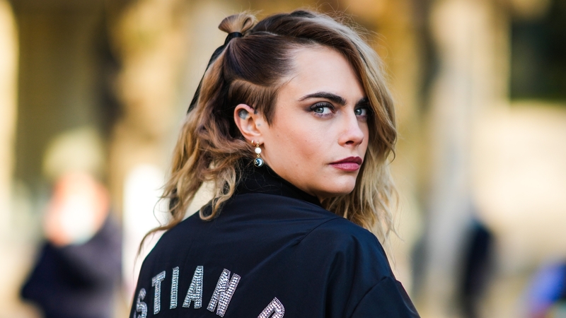 Cara Delevingne (pictured at Paris Fashion Week last week) - "I would have not been so ashamed if I'd had someone"