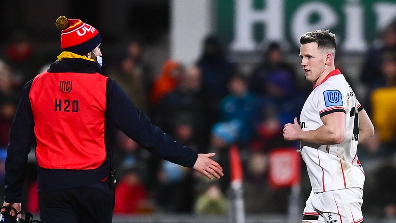 Craig Gilroy (R) leaves the field after receiving a yellow card
