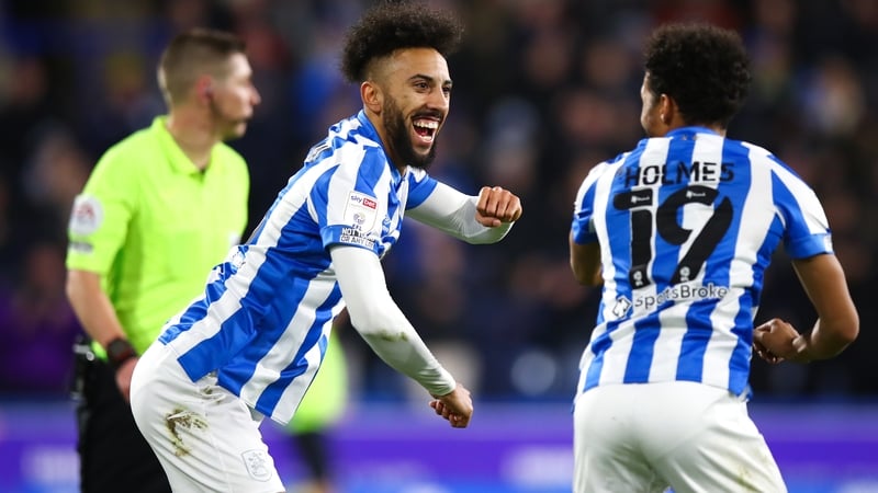 Huddersfield Town's Duane Holmes celebrates with Sorba Thomas