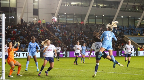 Manchester City's Lauren Hemp scores a goal to make it 3-0 against Spurs