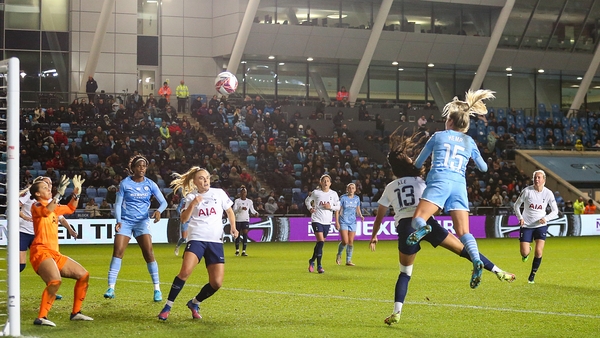 Manchester City's Lauren Hemp scores a goal to make it 3-0 against Spurs