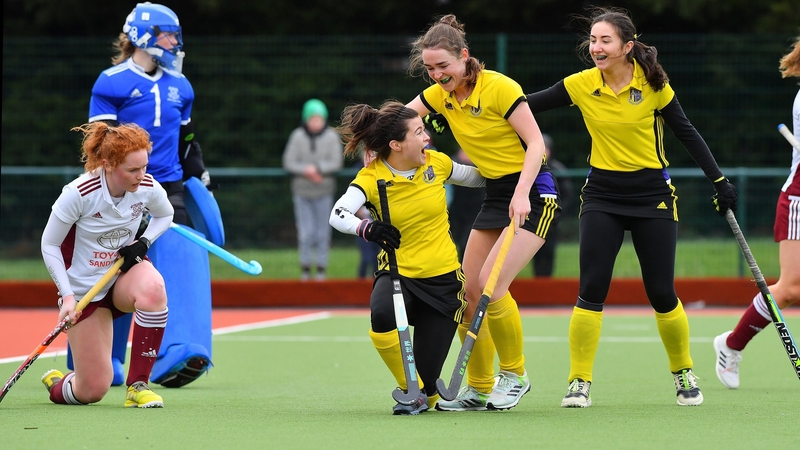 Pembroke's Aisling Naughton celebrates with Rachel O'Brien and Martha McCready. Pic: Adrian Boehm