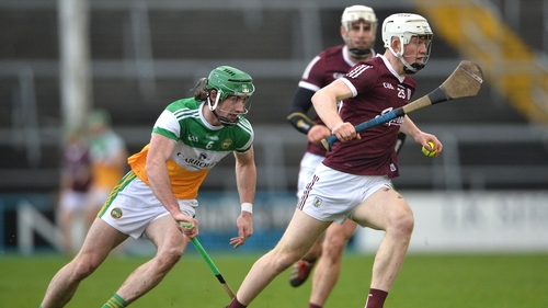 Galway's John Fleming darts clear of Ben Conneely
