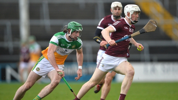 Galway's John Fleming darts clear of Ben Conneely