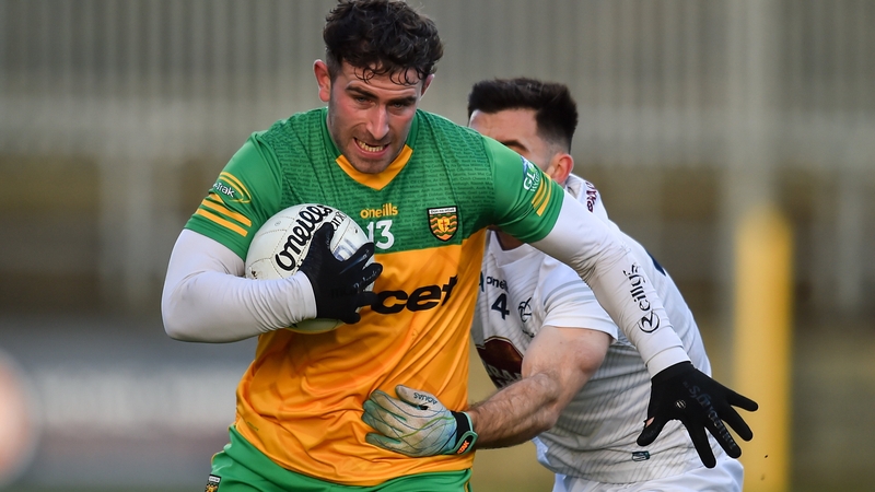 Paddy McBrearty of Donegal tries to hold off Ryan Houlihan of Kildare