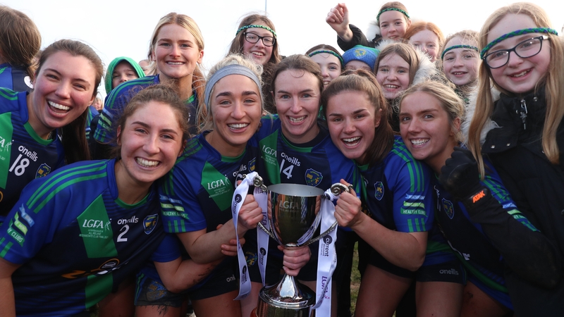 St Sylvester's players and fans celebrate with the cup