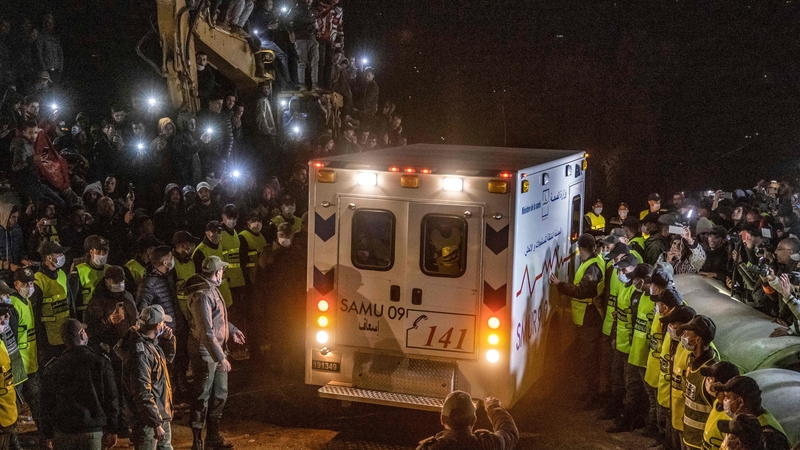 An ambulance carrying Rayan, who was trapped for five days in a deep well, leaves the area as the rescue operation ends