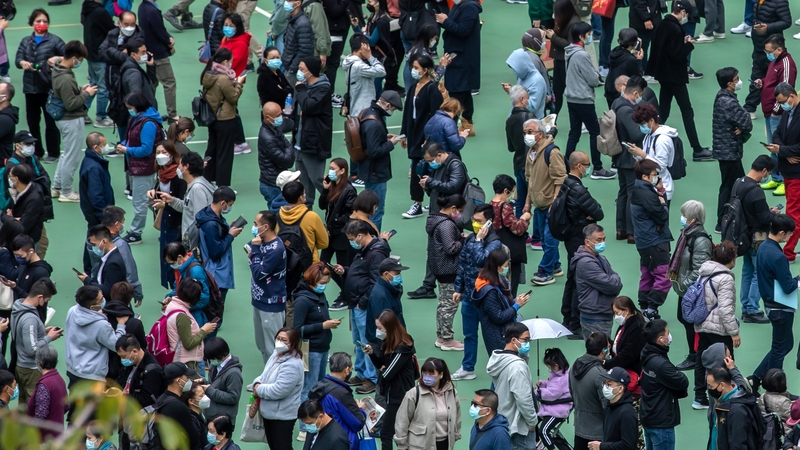 People queue for Covid tests in Hong Kong
