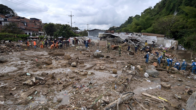 Rescue teams dug through the mud looking for survivors