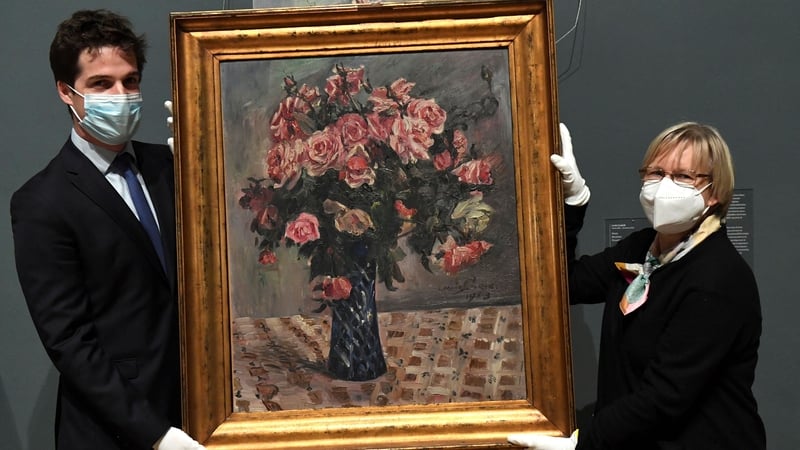 The painting, of pink flowers in a blue vase by German artist Lovis Corinth, belonged to Gustav and Emma Mayer