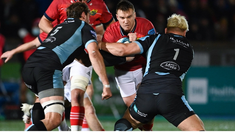 Munster's Rory Scannell attempts to break the Glasgow cover