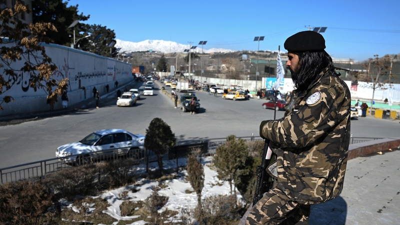 A Taliban fighter stands guard in Kabul
