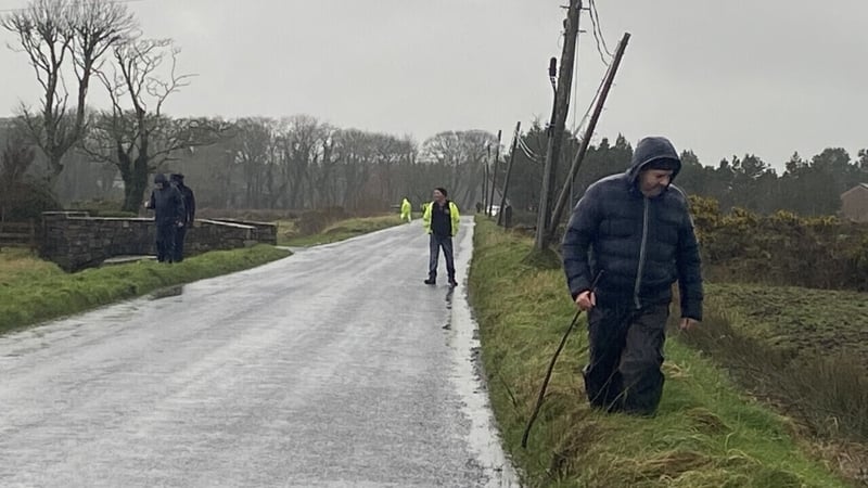 Dozens of volunteers are searching along the N59
