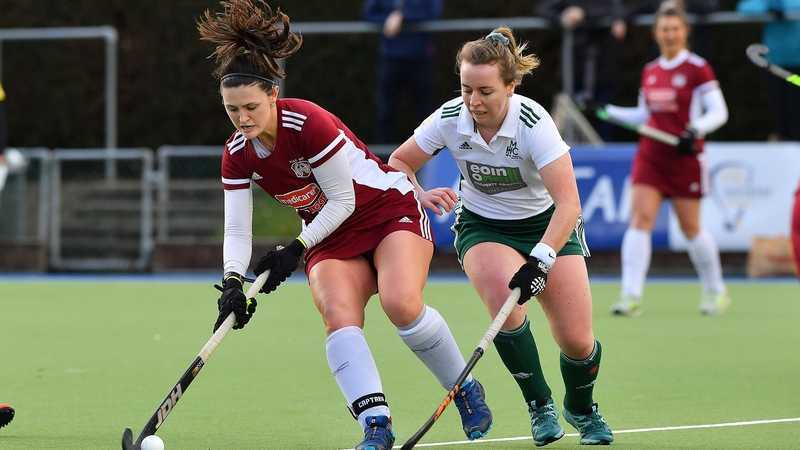 Catholic Institute's Roisin Upton (L) holds off Muckross's Sophie Barnwell. Photo: Adrian Boehm