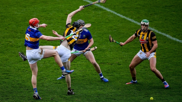 Kilkenny players Tom Phelan and Paddy Deegan contest possession with Tipperary pair Dillon Quirke and Alan Flynn.