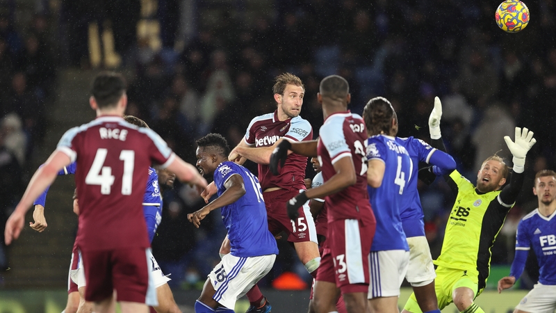 Craig Dawson rises highest to rescue a point for West Ham.