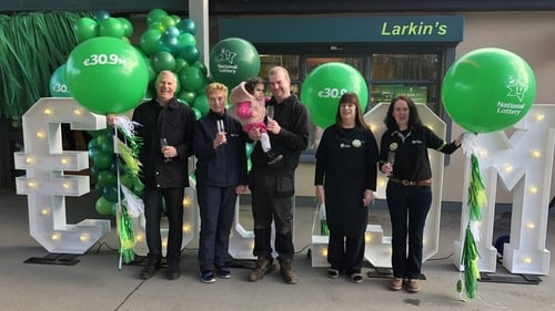 Celebrations at Larkin's family store in Ballina, Co Tipperary after selling the €31m ticket